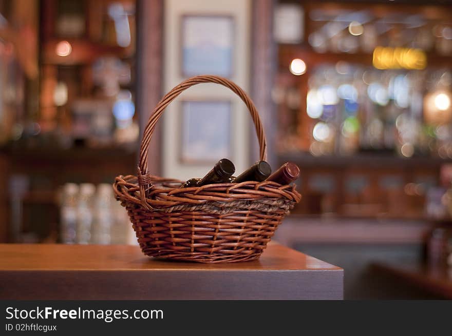 A basket with wine bottles