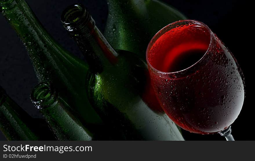 Red wine on black background