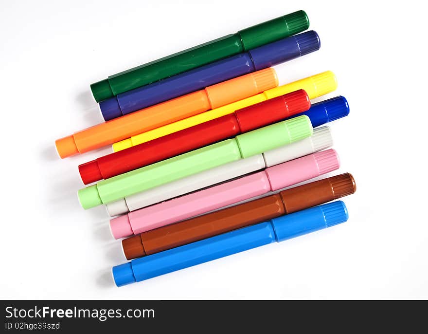 Multicolored markers isolated on a white background