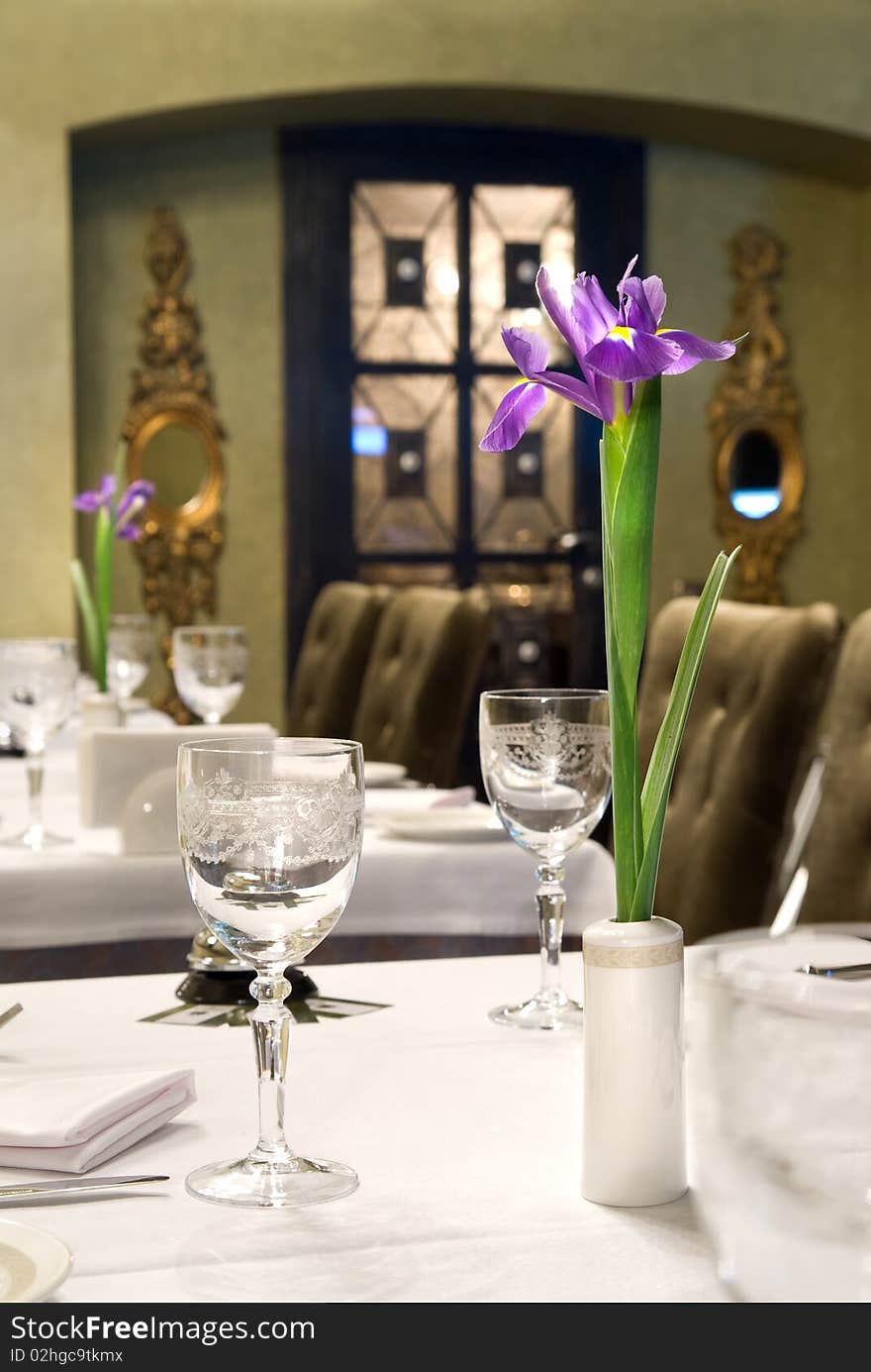 Served table in restaurant with flower