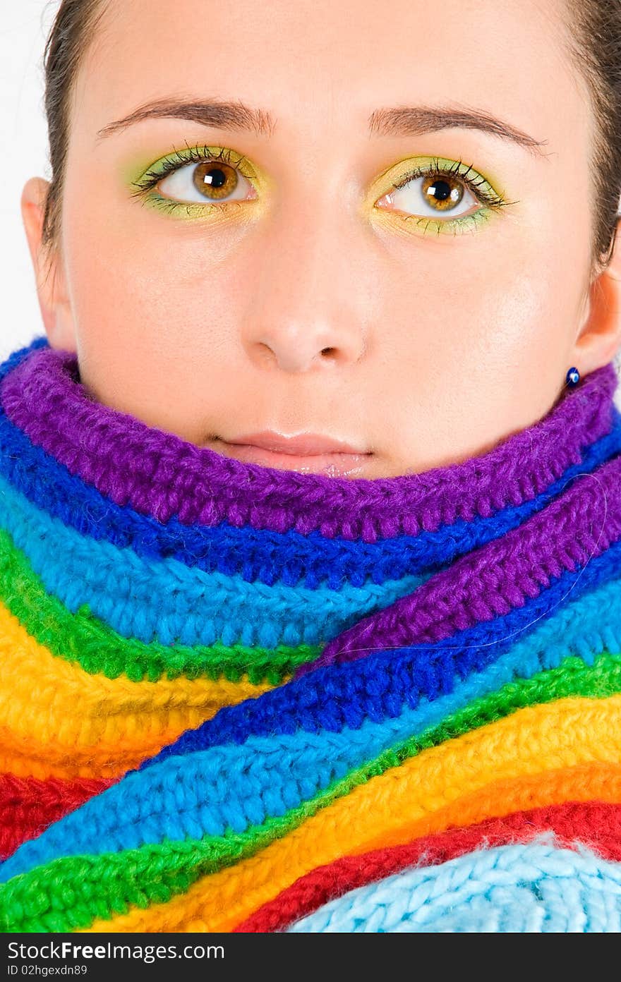 Beautiful young girl with colored scarf