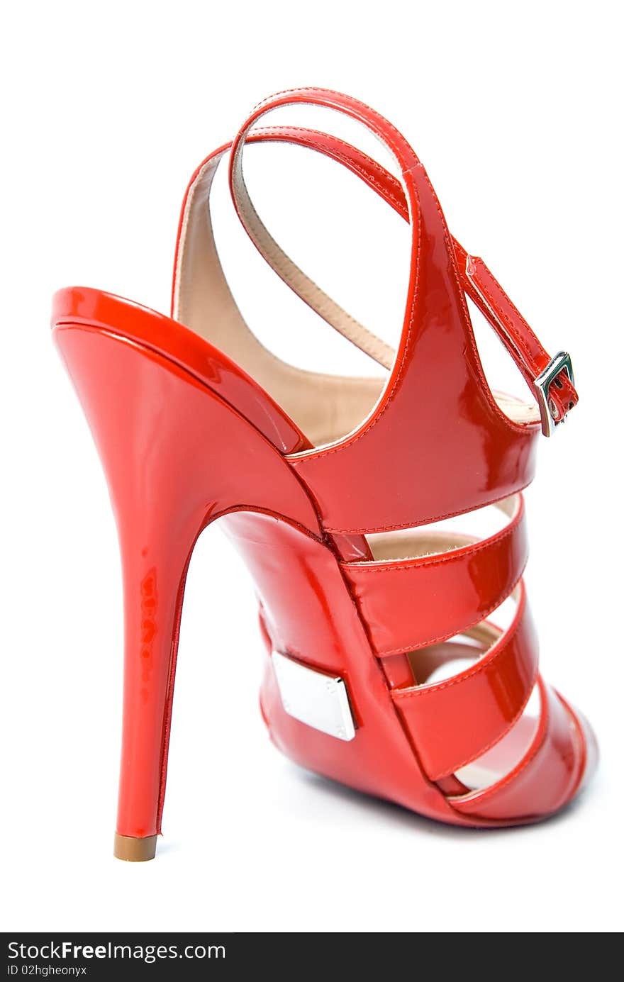 Red leather female shoe isolated