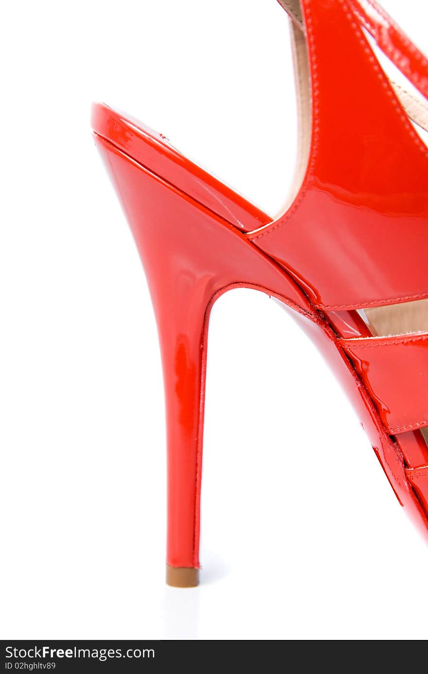 Heel of red leather female shoe