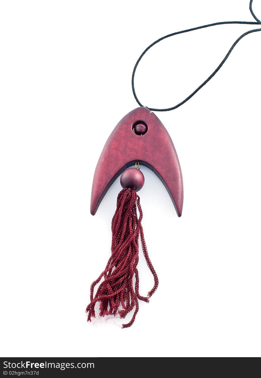 The pendent made of mahogany in the form of fish,isolated white background