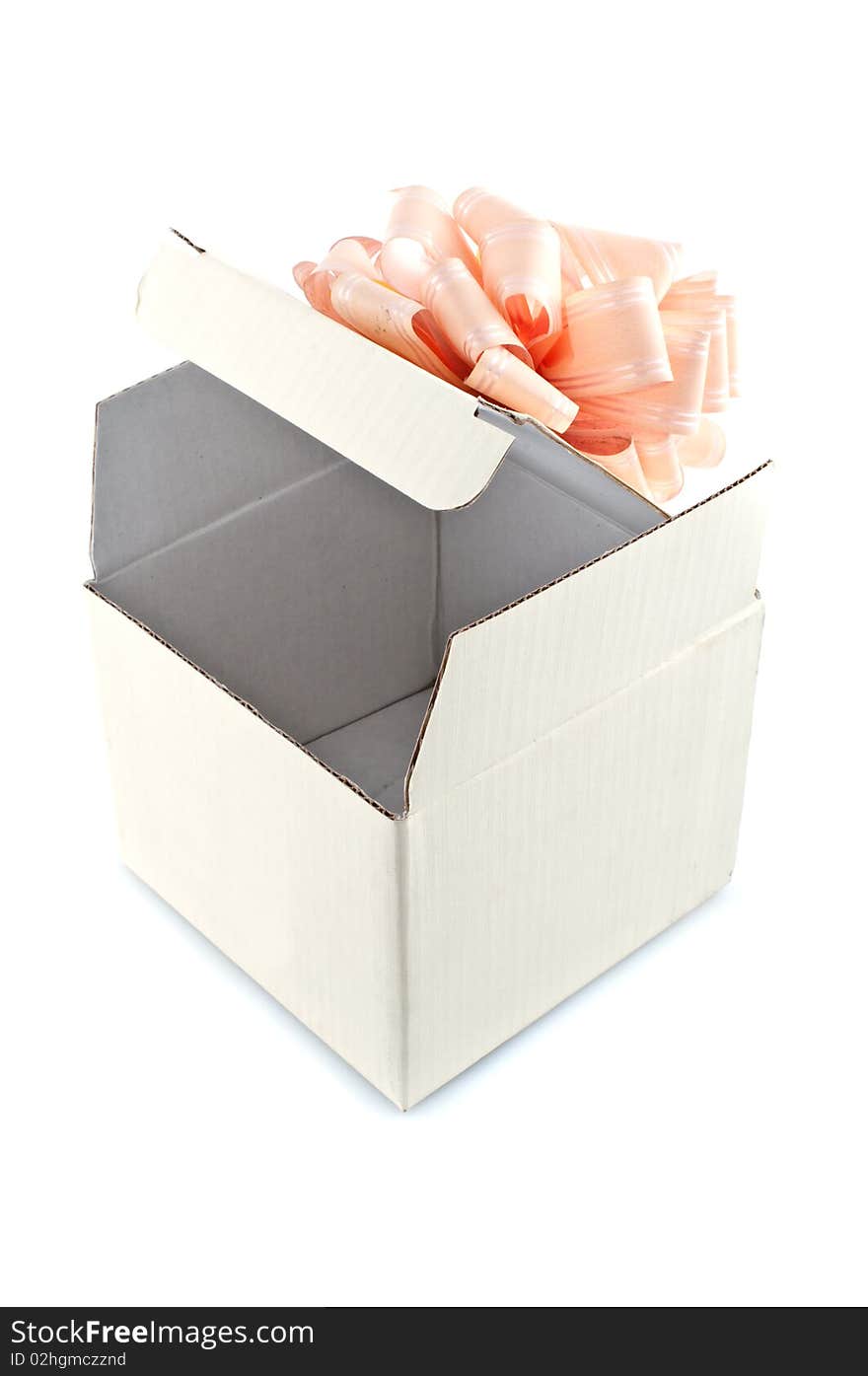 Gift box with rose-colored ribbon