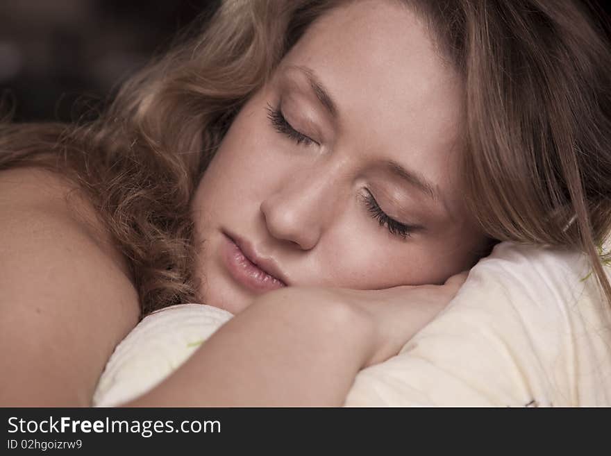 Young girl sleeping on a pillow. Young girl sleeping on a pillow