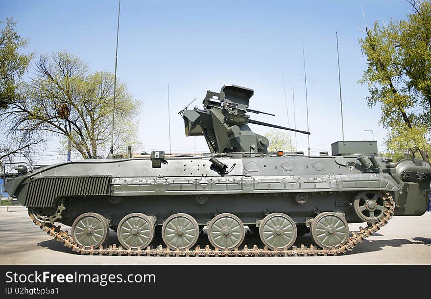 Military armored vehicle at army show with selective focus