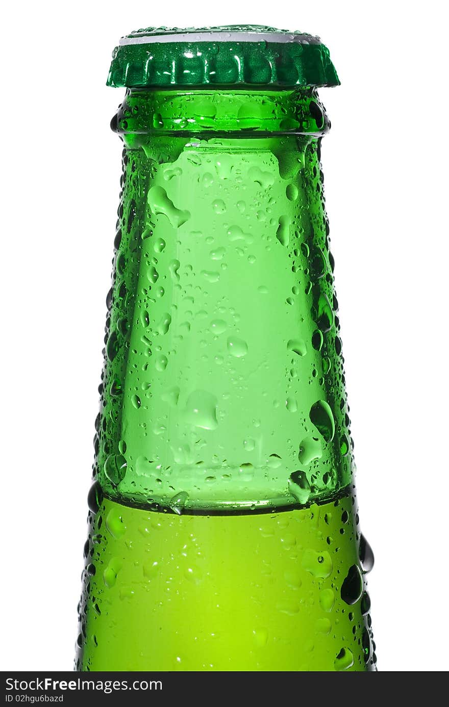 Green beer bottle with water drops