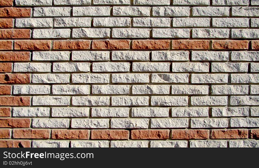 Background. Wall from white and red silikate bricks. Background. Wall from white and red silikate bricks.