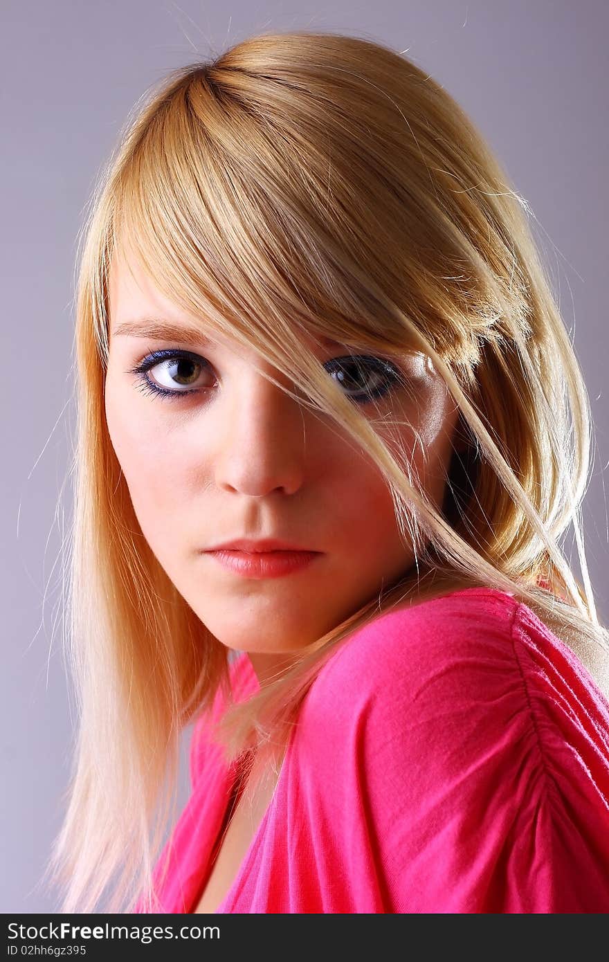 Portrait of beautiful blond woman, studio shot. Portrait of beautiful blond woman, studio shot