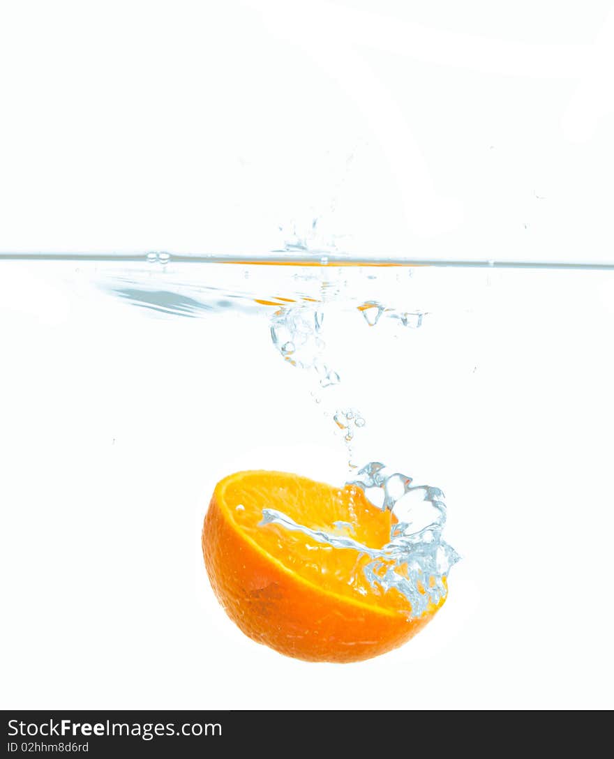 Fresh Orange splash in water