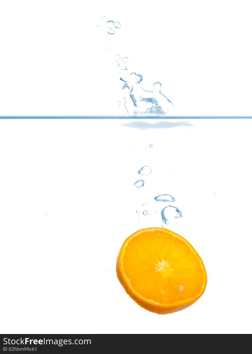 Fresh Orange splash in water