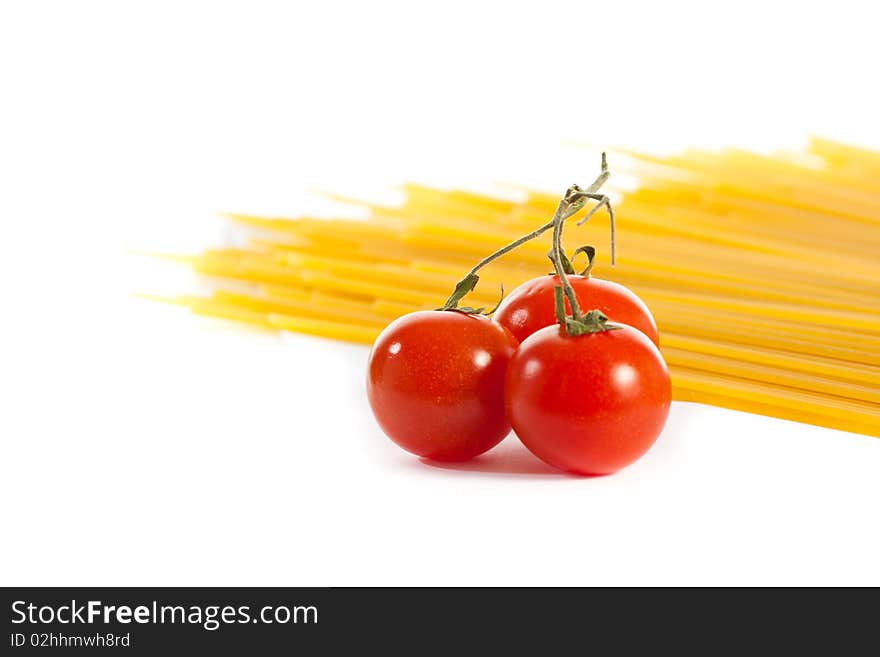 Tomatoes  and pasta isolated on white. Tomatoes  and pasta isolated on white