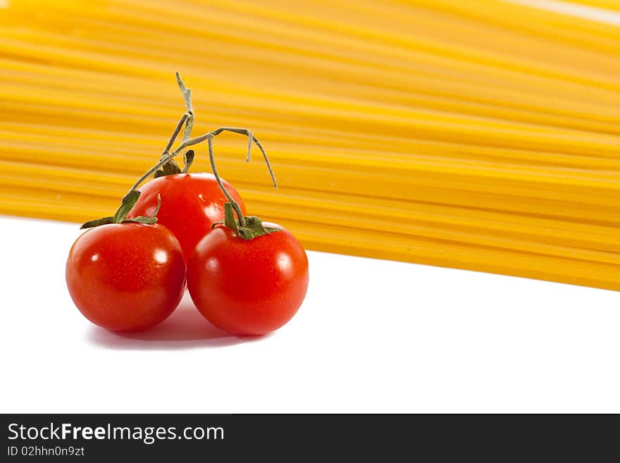 Tomatoes  and pasta isolated on white. Tomatoes  and pasta isolated on white