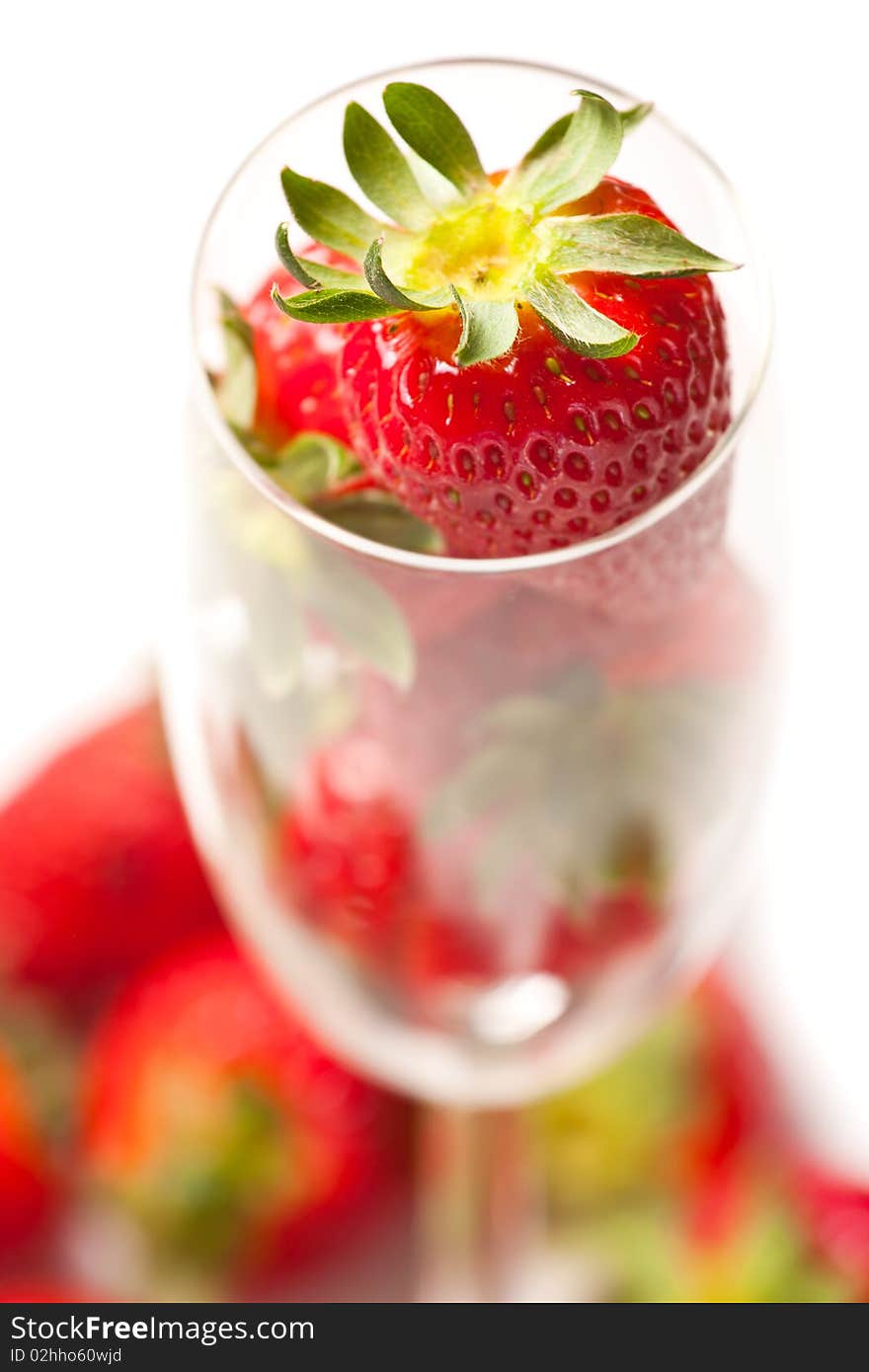 Fresh strawberries in glass on white background. Fresh strawberries in glass on white background