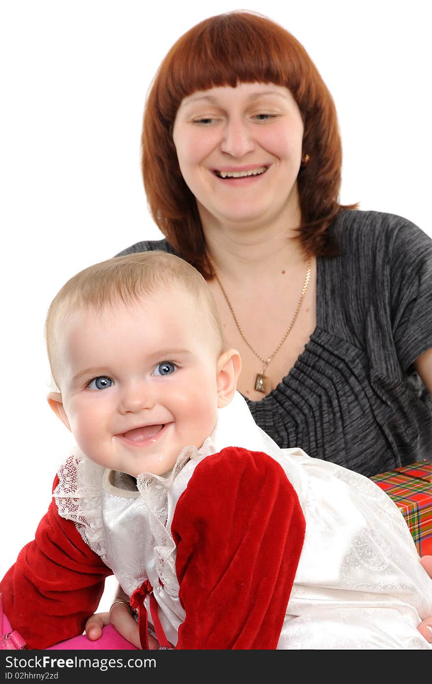 Happy mother and daughter smiling isolated over a white background