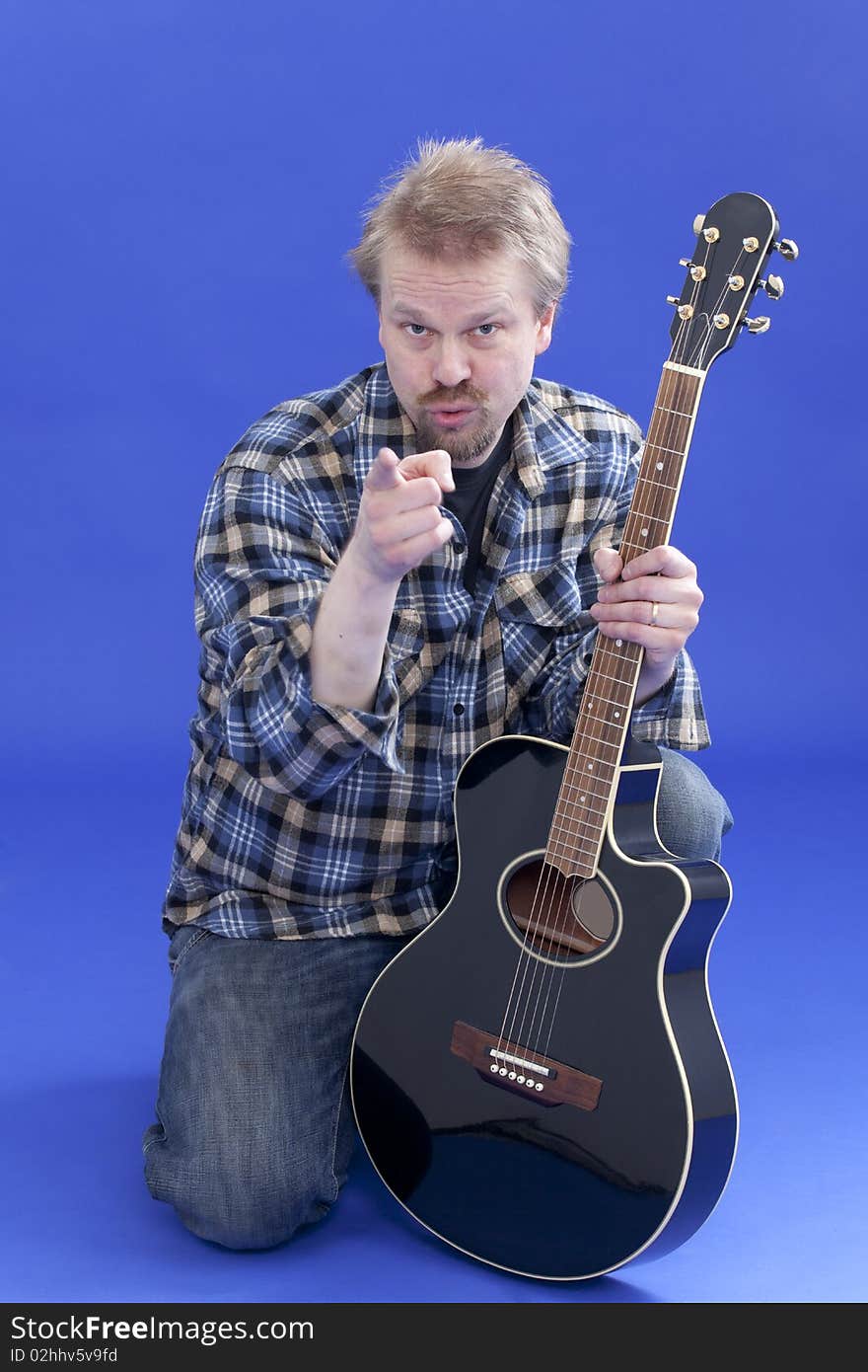 Portrait Of A Man With Guitar