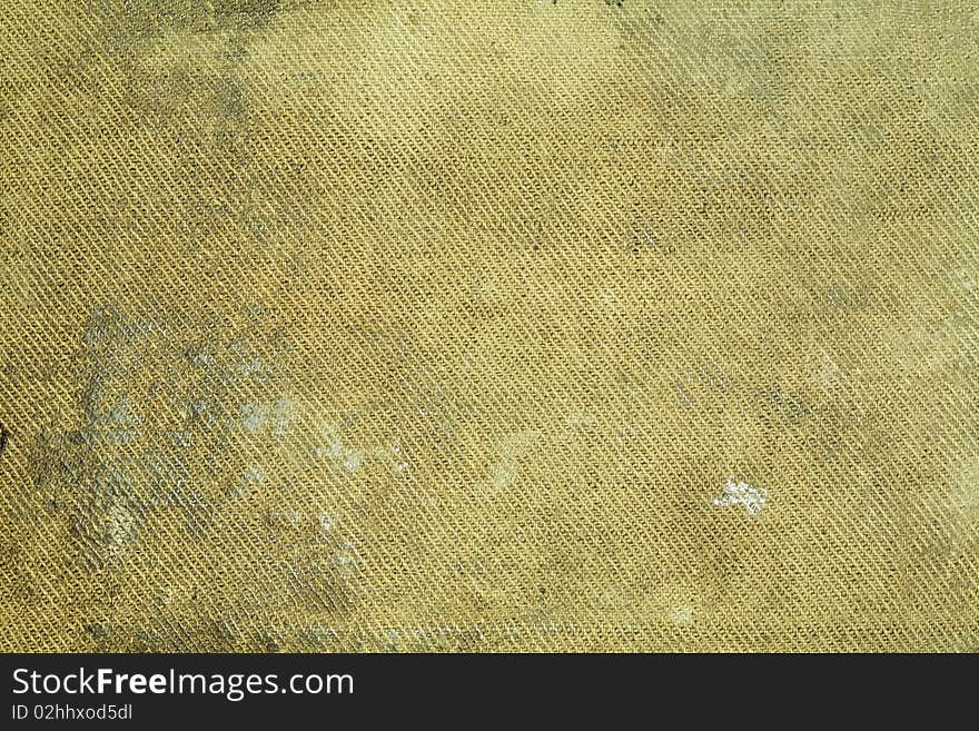 Dirty shabby stained old canvas background. Dirty shabby stained old canvas background