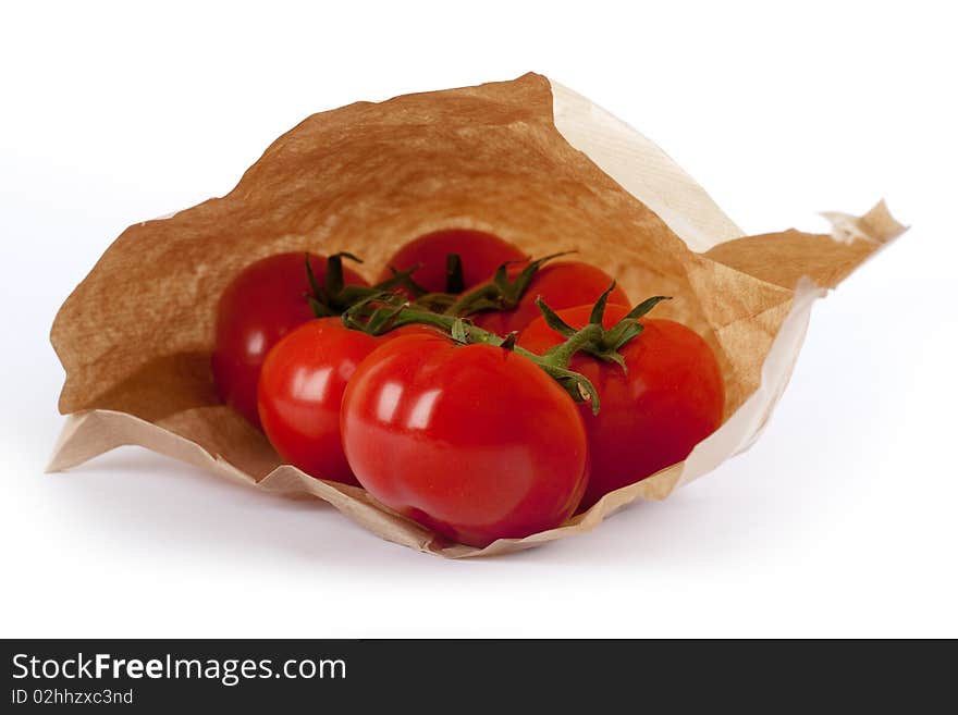 Tomatoes in paper bag