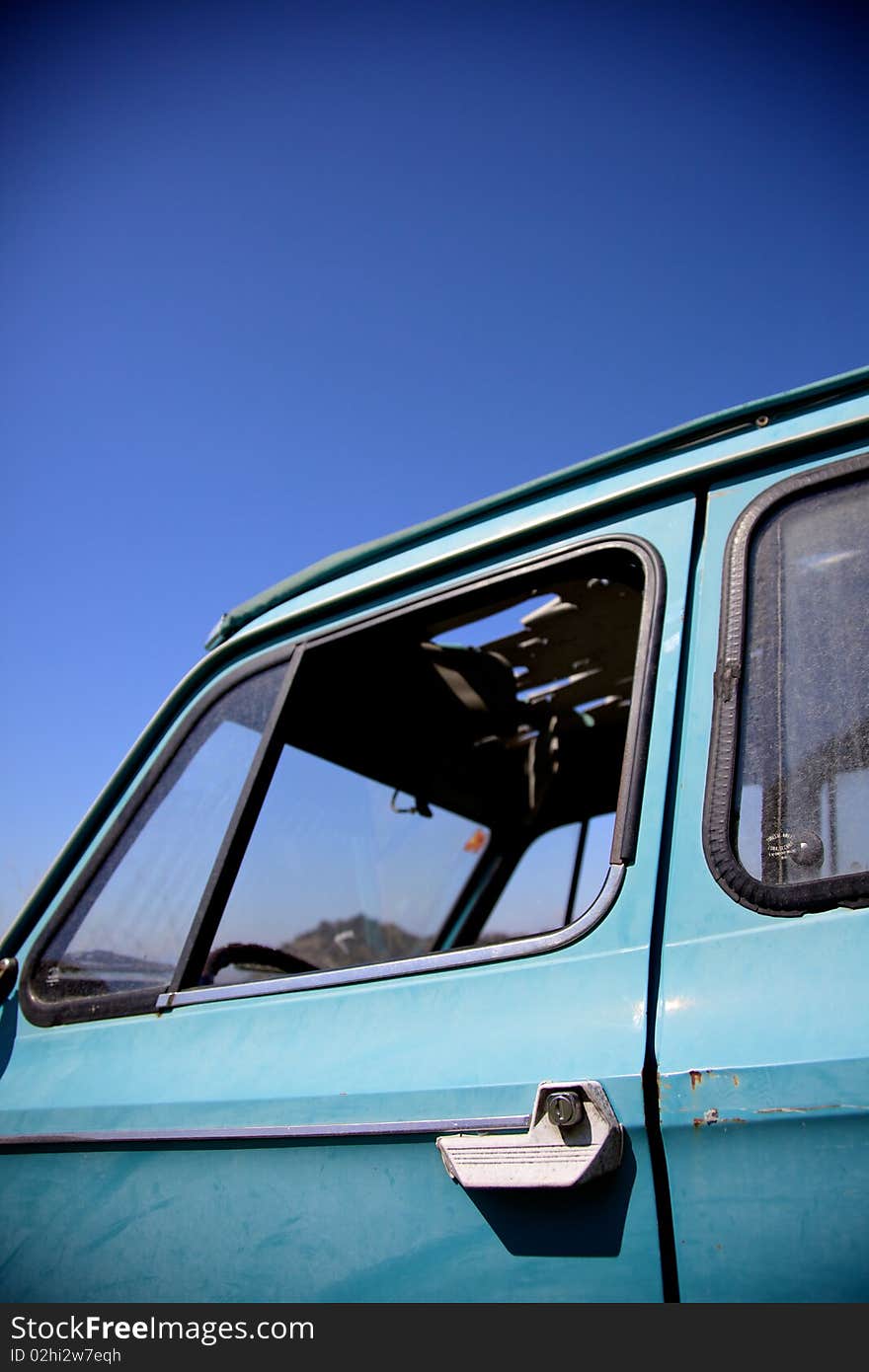 Old citroen 2cv door. Abandoned car out in the fields. Old citroen 2cv door. Abandoned car out in the fields