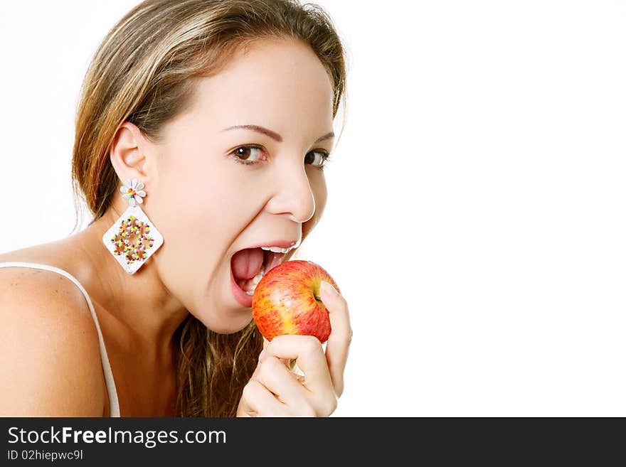 Woman eating apple and looking at the camera, Isolated on white. Woman eating apple and looking at the camera, Isolated on white