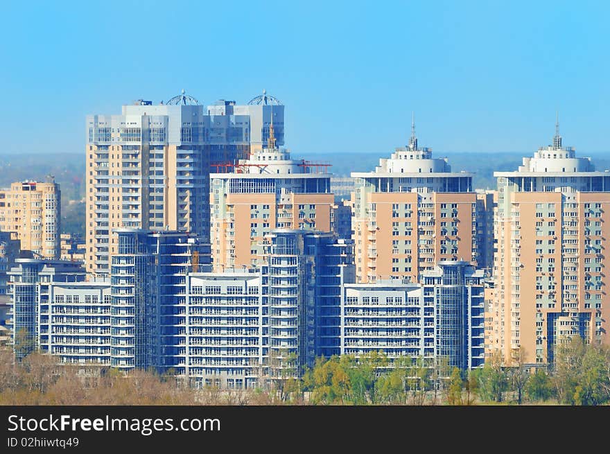 New living high-rises in the city during sunny day. New living high-rises in the city during sunny day