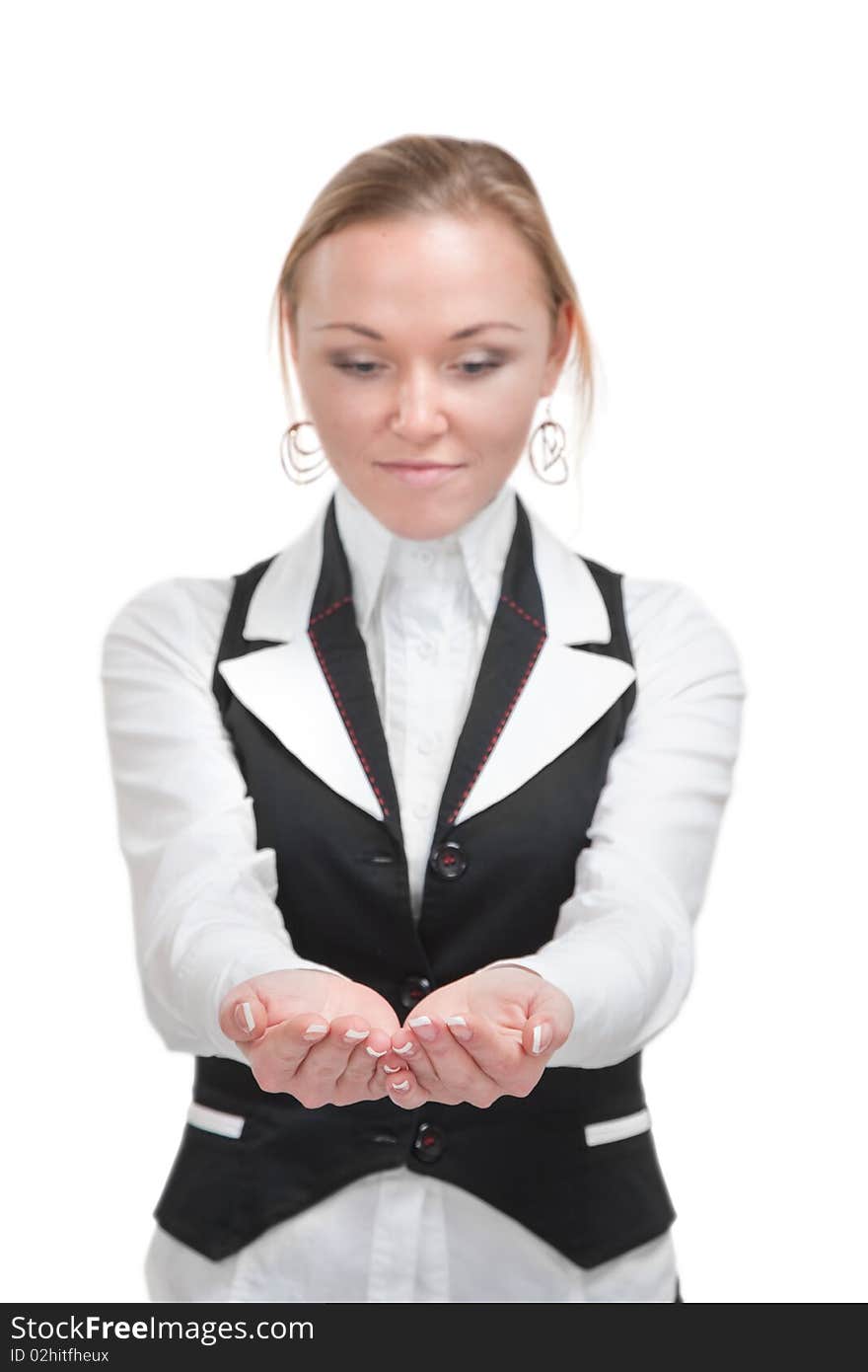 Young attractive woman held out her hand as if holding something in them. Focus on the hands. Young attractive woman held out her hand as if holding something in them. Focus on the hands.