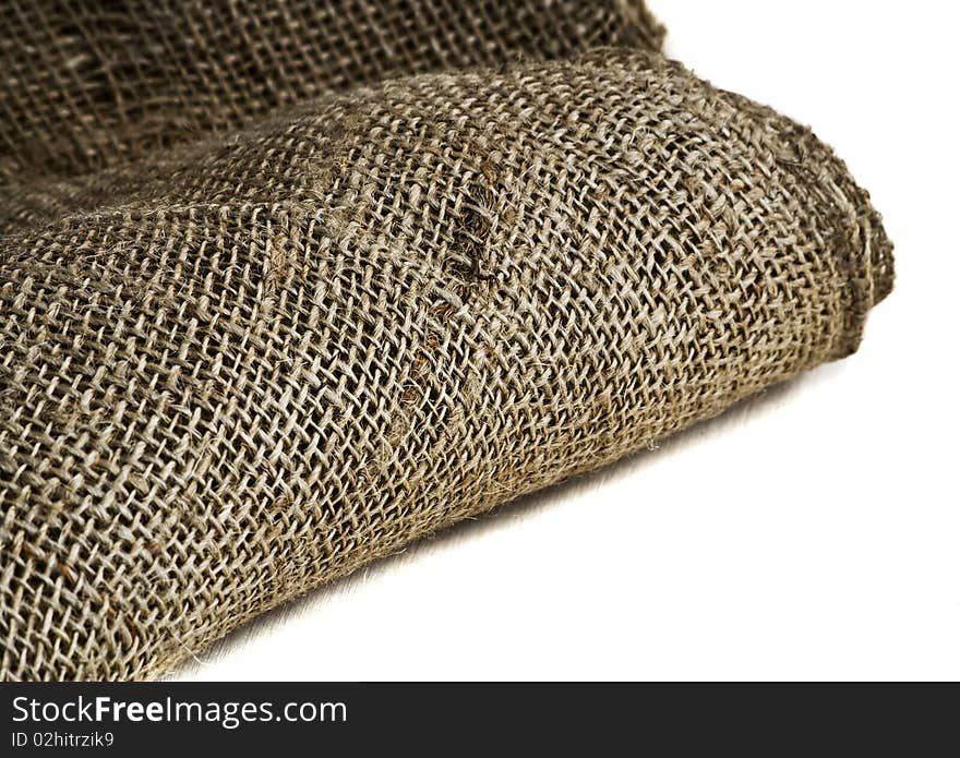 Roll of burlap on a white background