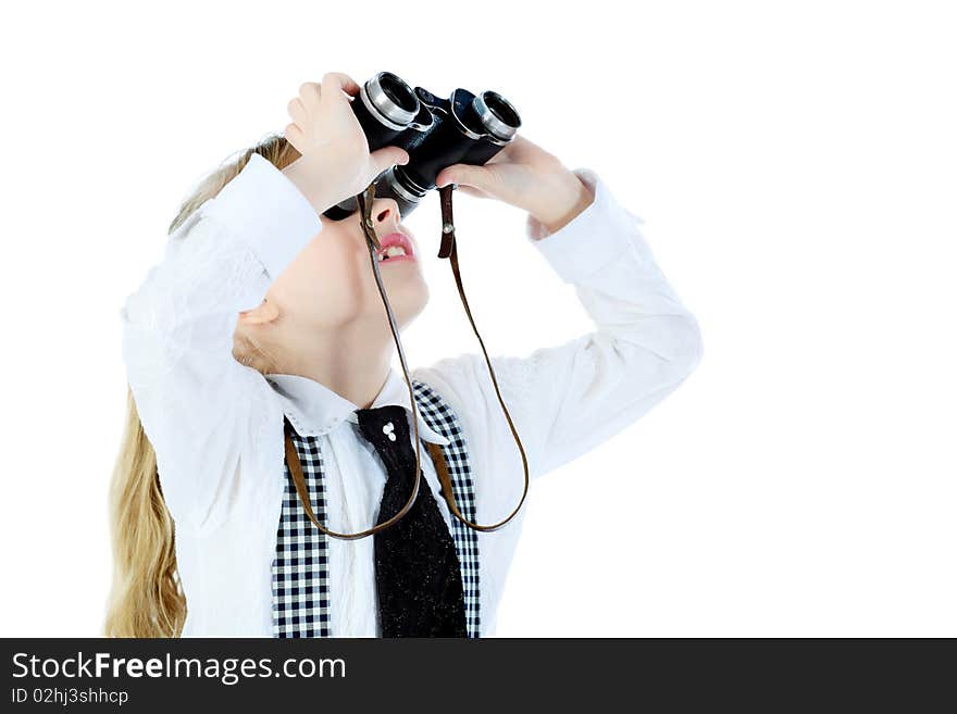 Shot of a girl looking up through a binocular. Isolated over white background. Shot of a girl looking up through a binocular. Isolated over white background.