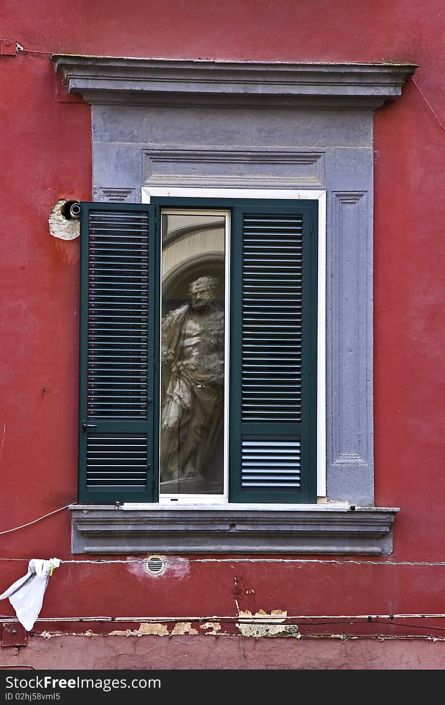 The statue in the window