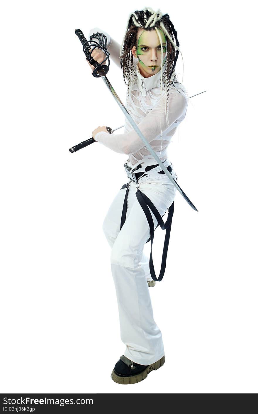 Shot of a stylish male warrior standing with his sword. Isolated over white background.