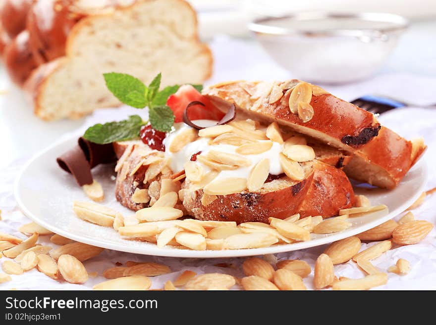 Slices of sweet bread with jam and almonds. Slices of sweet bread with jam and almonds