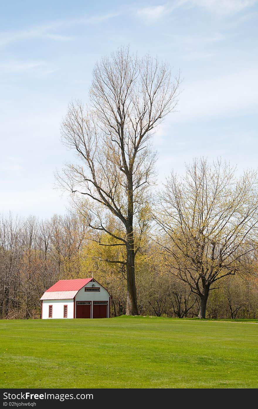 Red barn on the golf course. Serves as garage for electric golf carts.