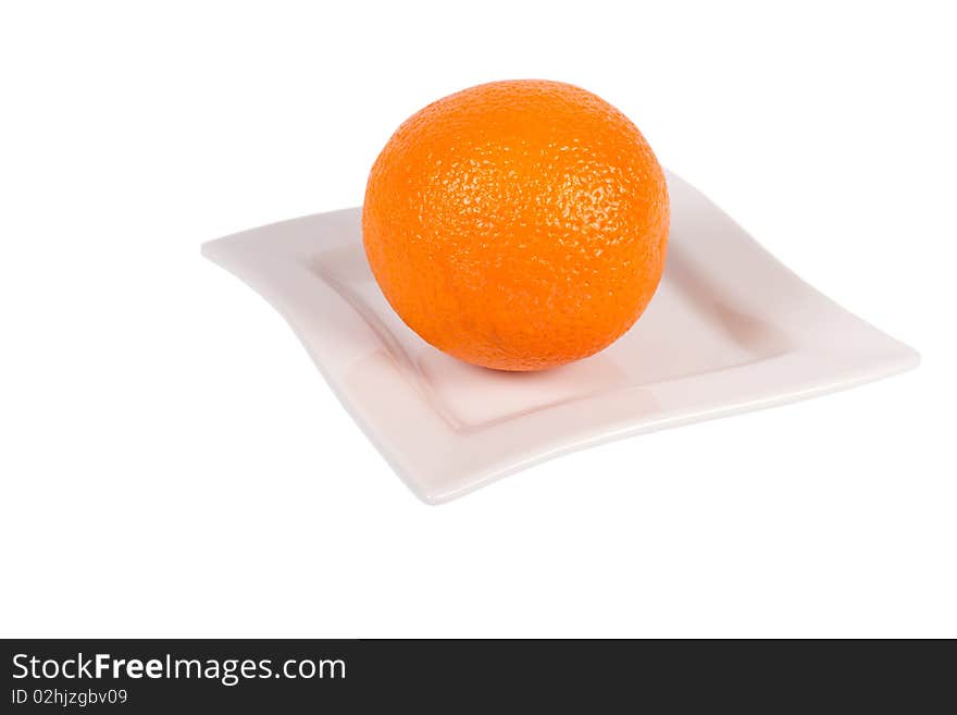 Fresh Orange on a white plate on white Background