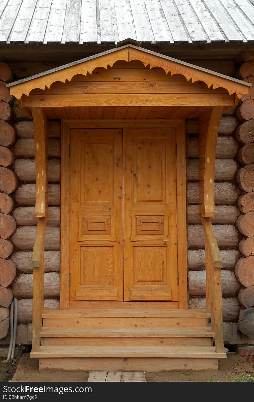 Front door of rural log wood house. Front door of rural log wood house