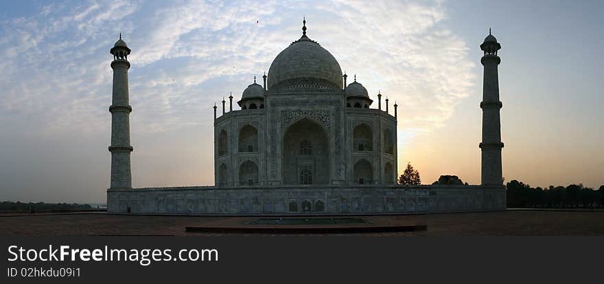 View on the Taj Mahal from the Western side at sunrise