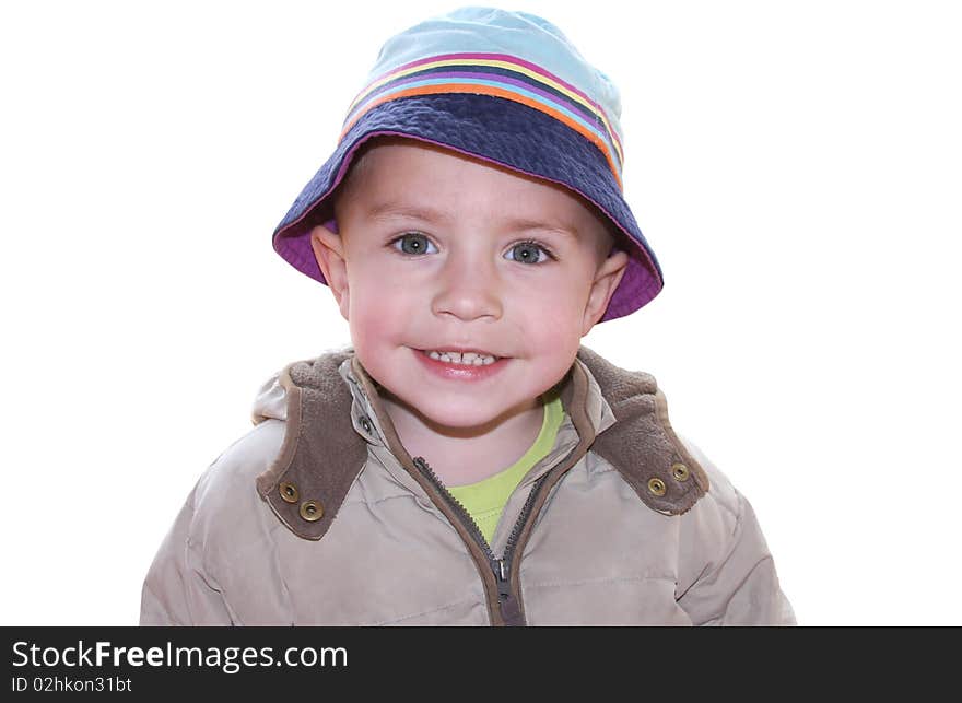 Sweet little boy smiling on white background