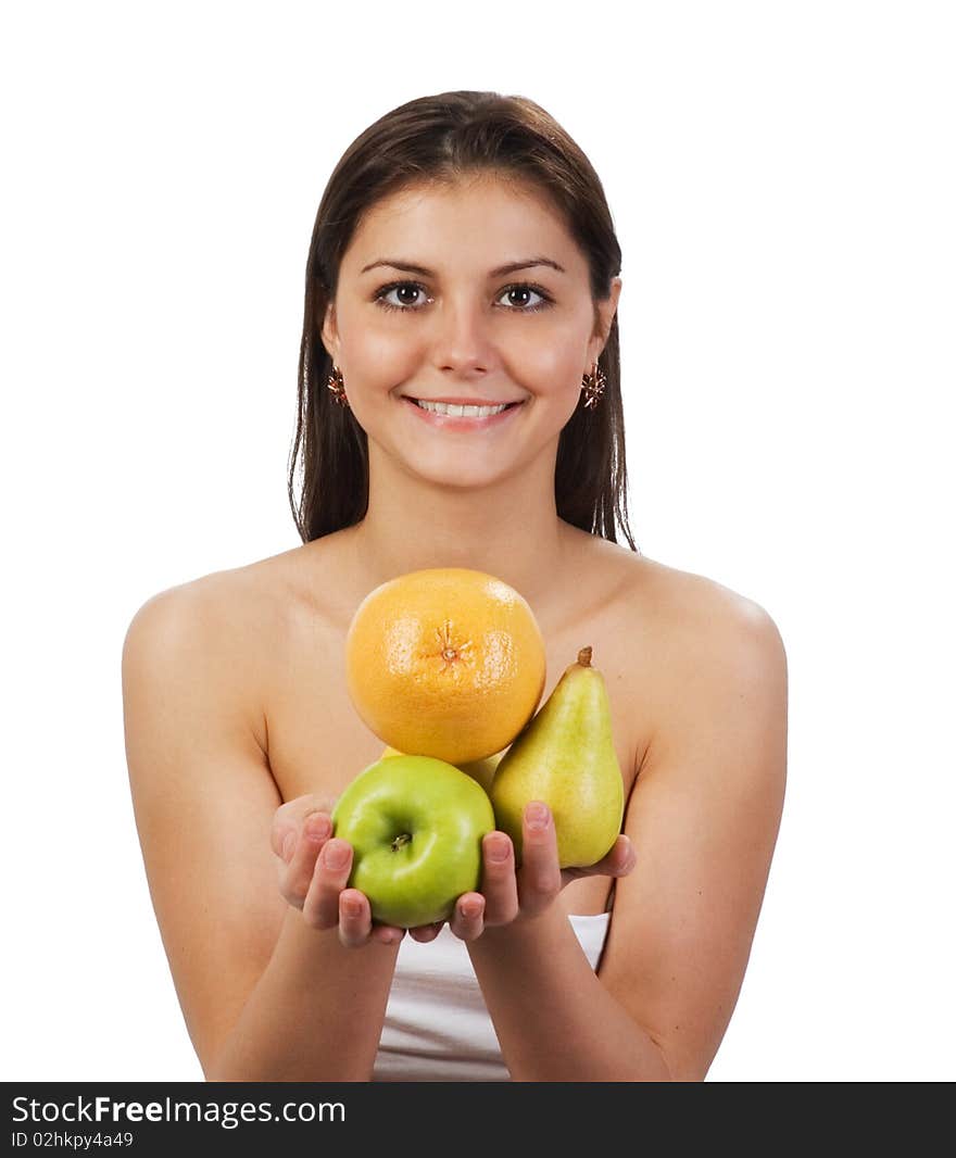 Pretty young girl with fruit in her hands on white background. Pretty young girl with fruit in her hands on white background