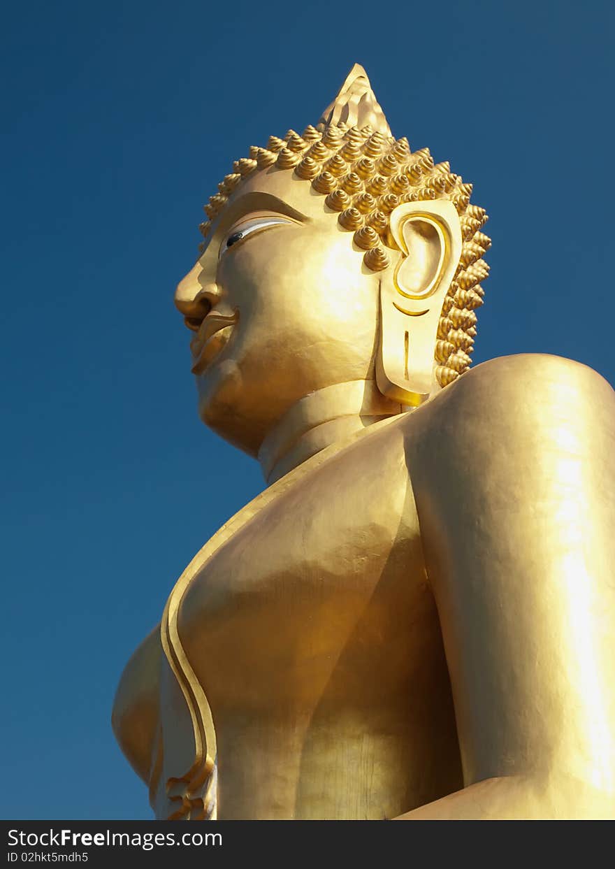 Buddha statue , profile shot taken in the midday, Wat Khao Phra Bat temple, Pattaya