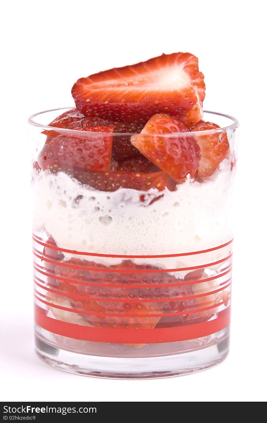 Strawberries with cream in a glass isolated. Strawberries with cream in a glass isolated