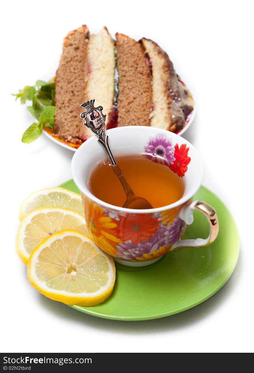 Cake with tea, lemon