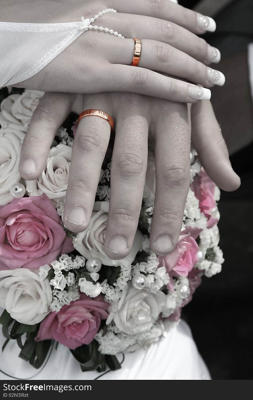 Hand of bride and groom