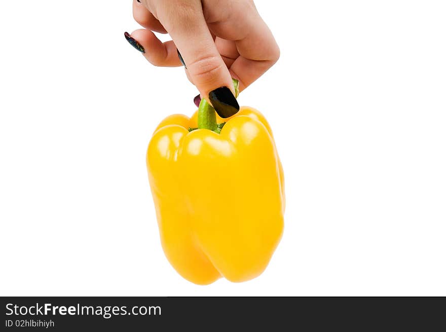 Yellow Pepper In A Hand