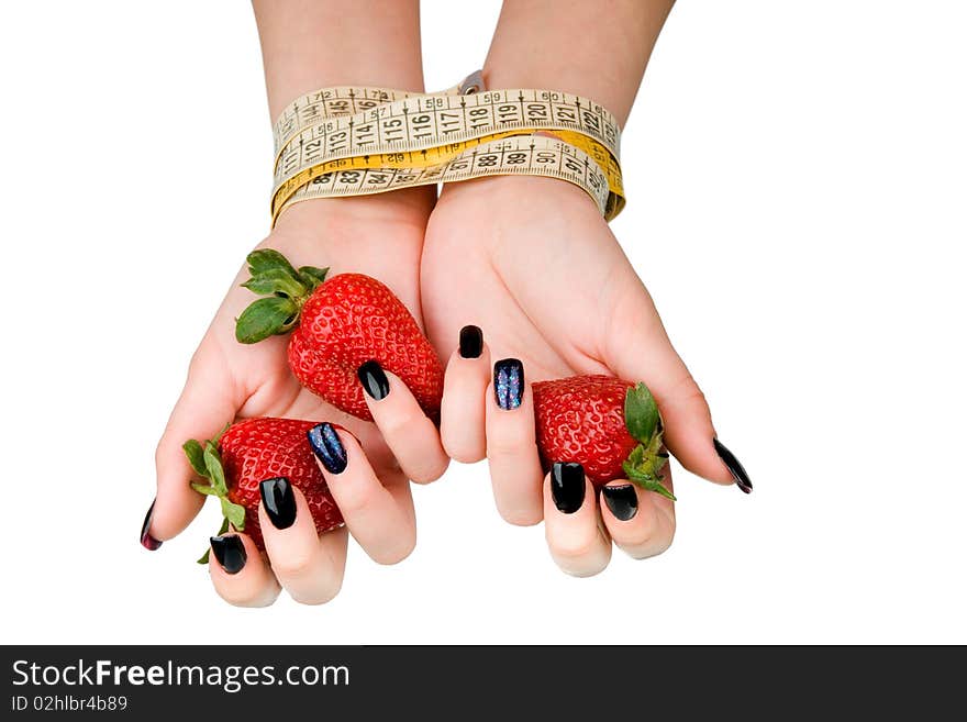 Strawberry in the female   hands.