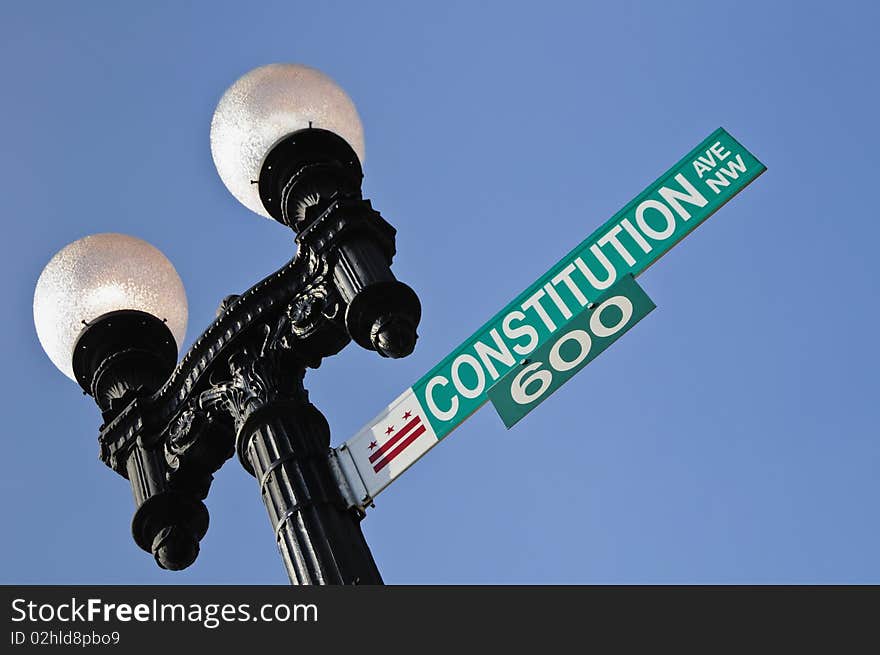 Constitution Avenue Sign in Washington DC against blue sky