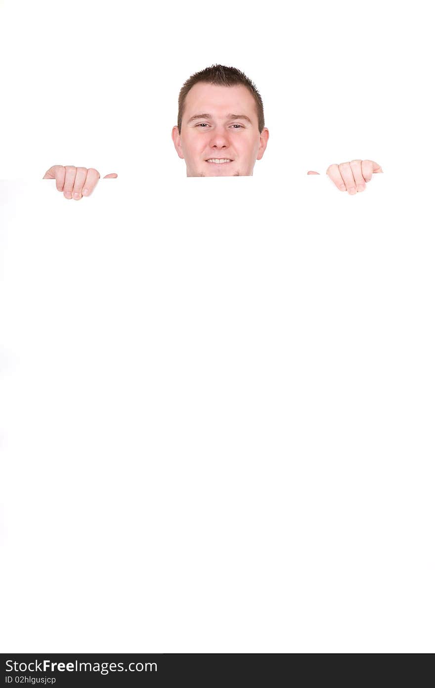 Casual man holding banner over white background. Casual man holding banner over white background