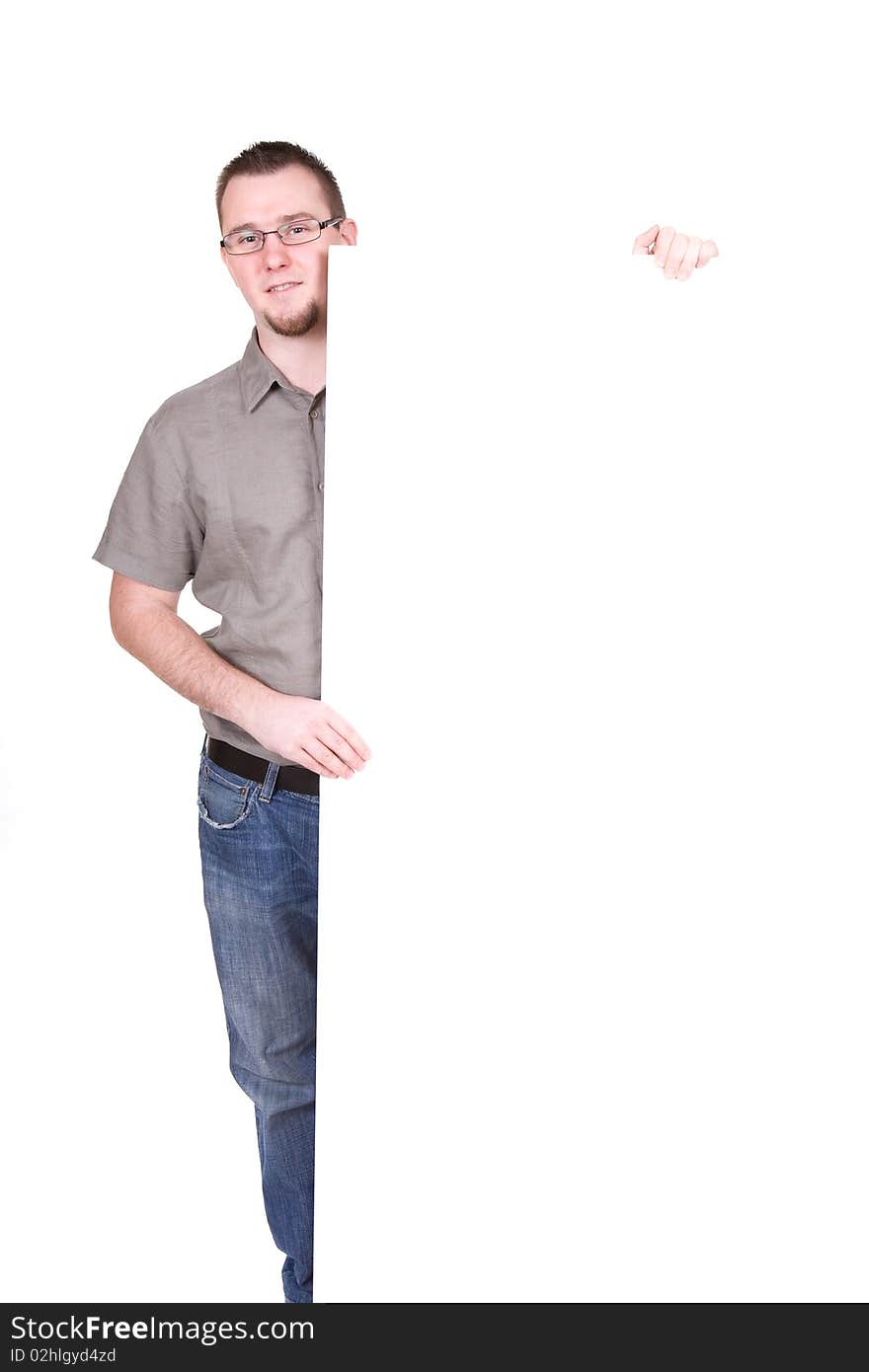 Casual man holding banner over white background. Casual man holding banner over white background