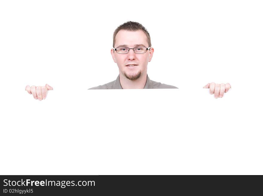 Casual man holding banner over white background. Casual man holding banner over white background