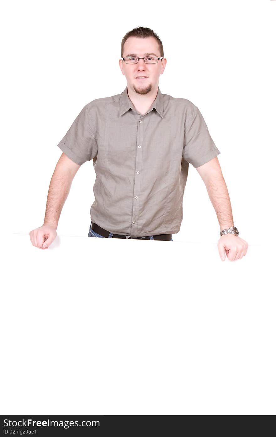 Casual man holding banner over white background. Casual man holding banner over white background