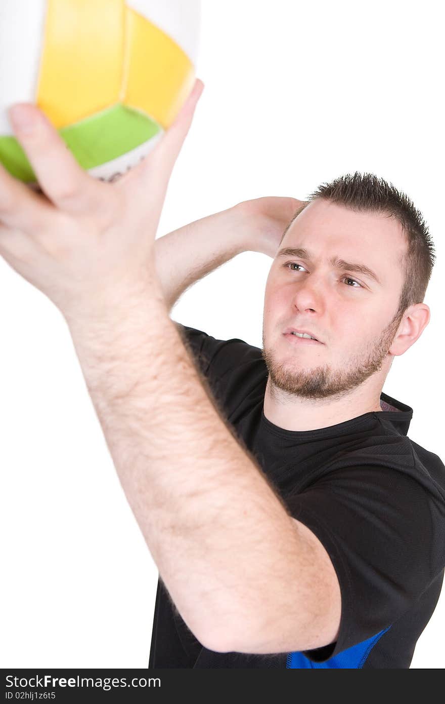 Young happy man with ball. over white background. Young happy man with ball. over white background